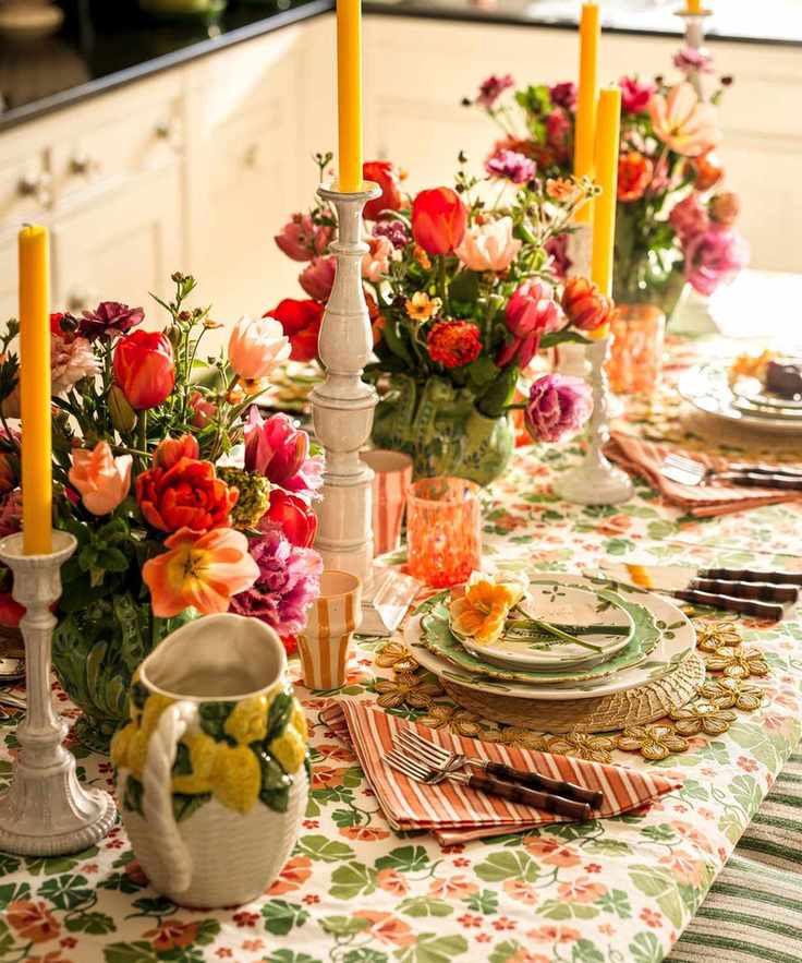 A high-angle view of a festive spring table set with vibrant tulip centerpieces