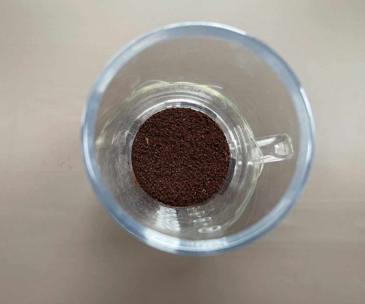 Coffee grounds inside the AeroPress following the AeroPress recipe