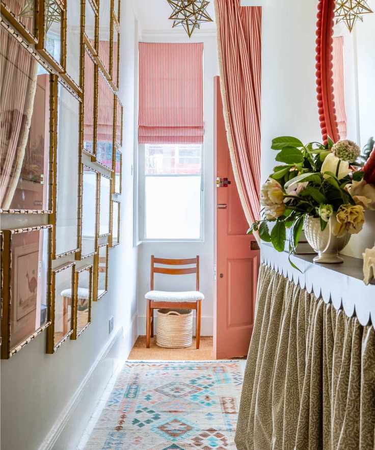 Small entryway with striped curtains