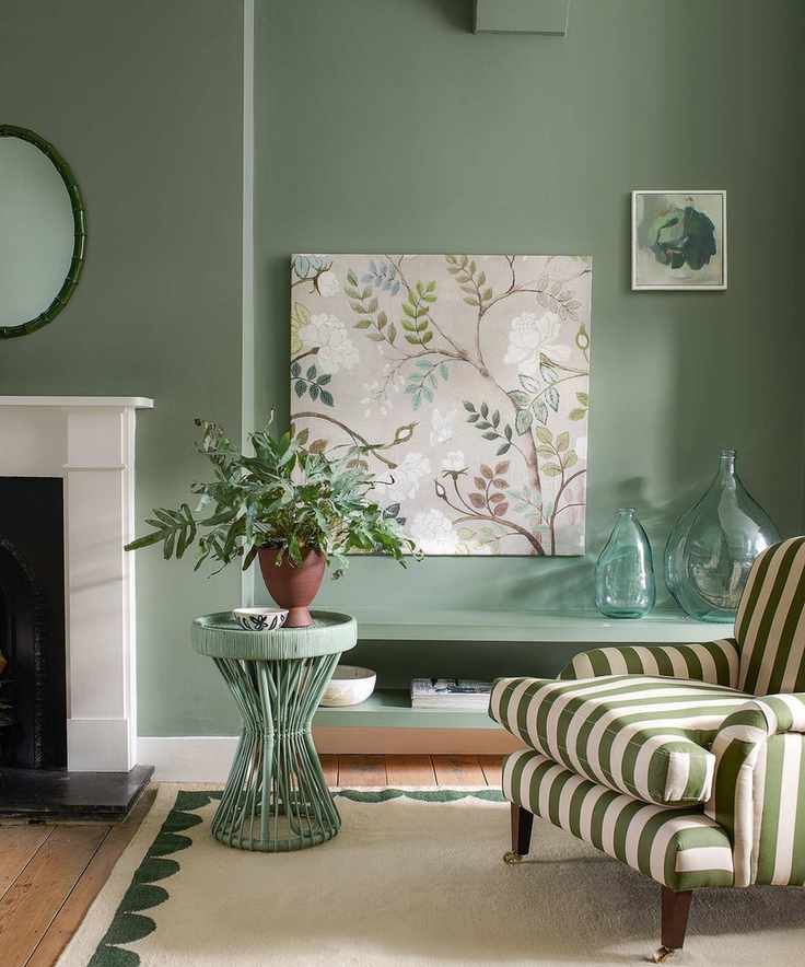 Green living room ideas with striped armchair