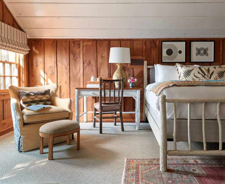 bohemian bedroom with wood panelled walls