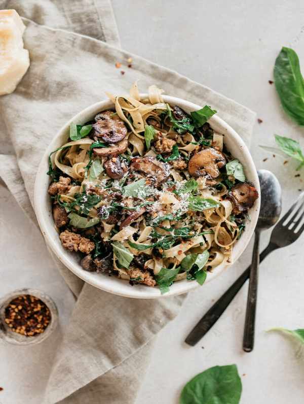 one pot sausage pasta recipe with mushrooms, and arugula