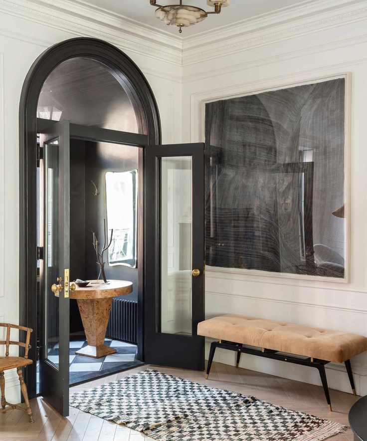 Black arched doorway in entryway