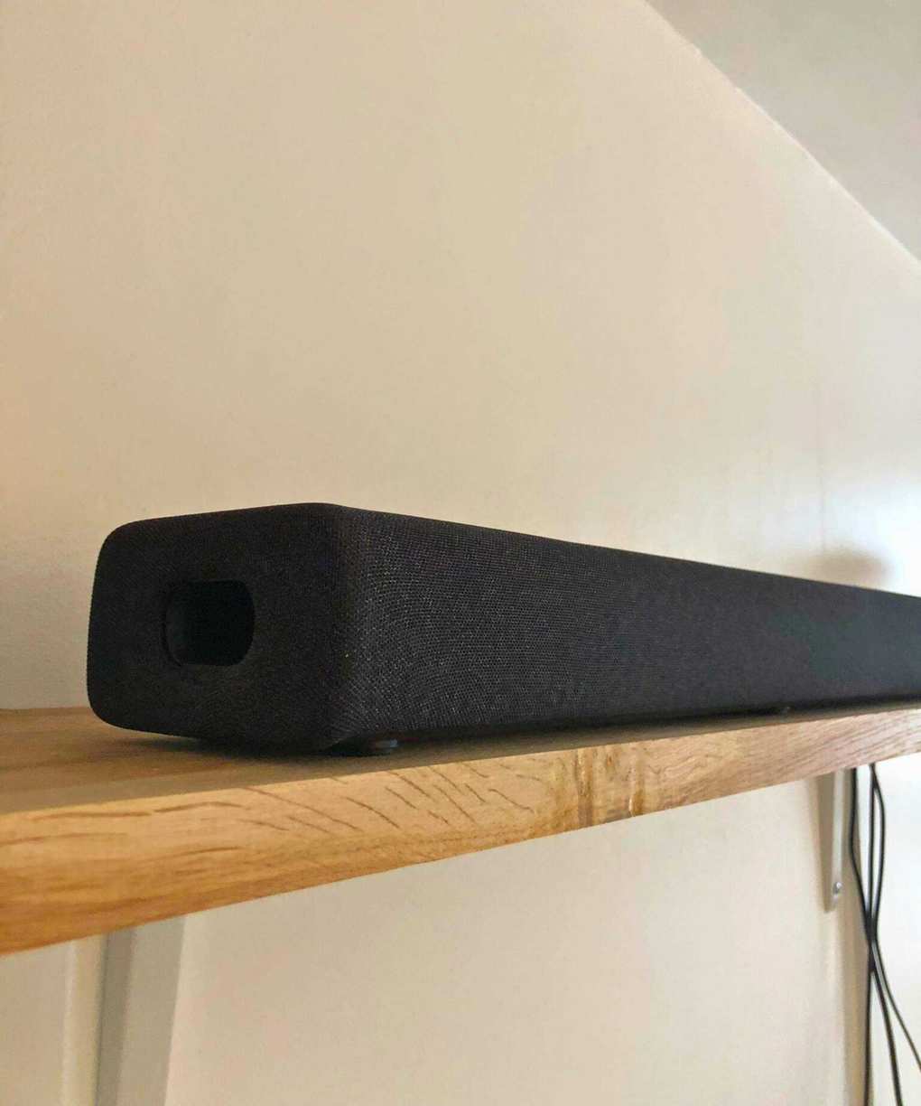 Yamaha True X Bar 40A soundbar on wooden shelf in Dan Fauzi's home.