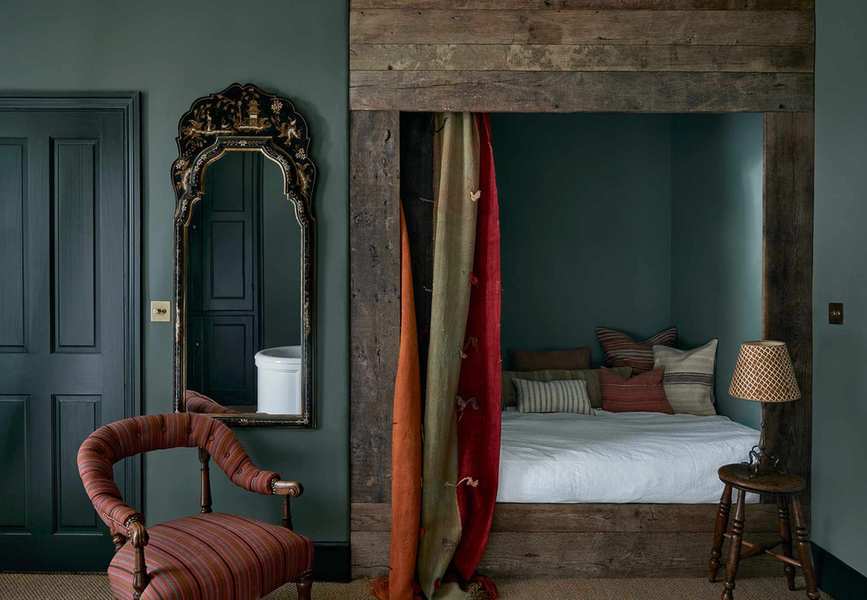 Small bedroom with a bed nook