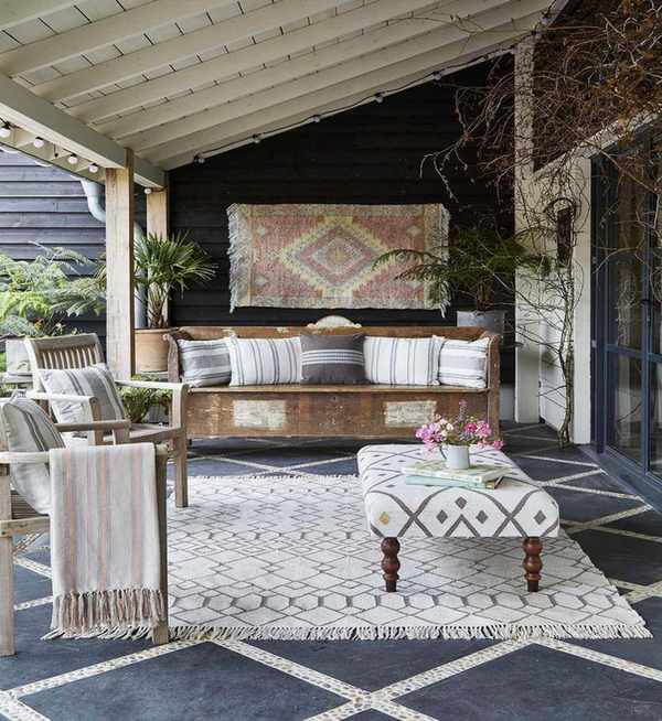 Charming front porch with vintage seating