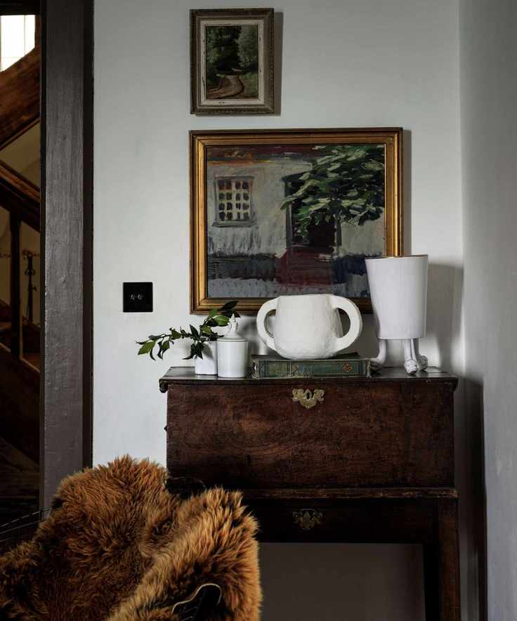 Display of vintage finds on a wooden sideboard