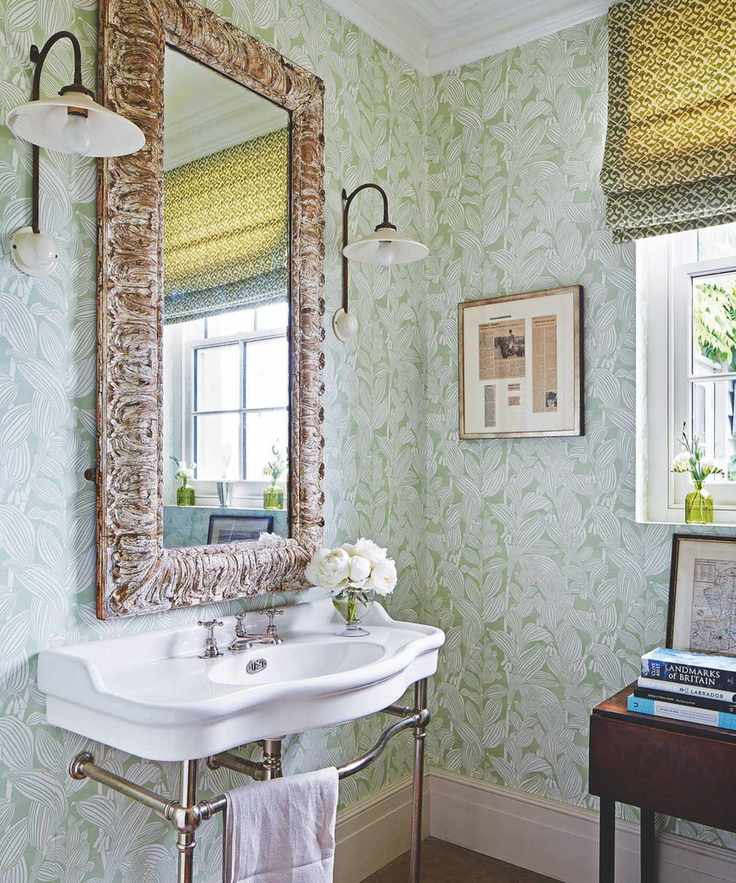Vintage bathroom with decorative mirror