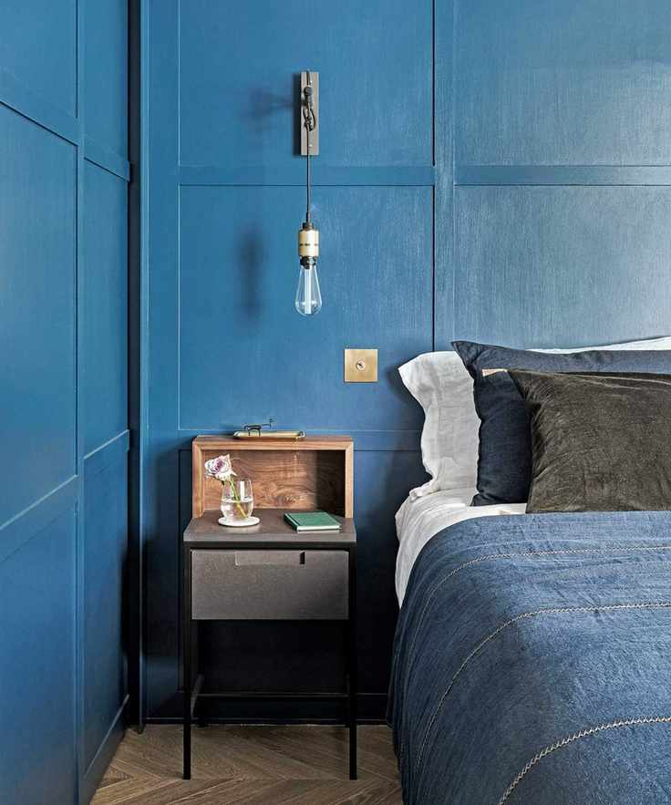 bedroom with bed, pillows and nightstand