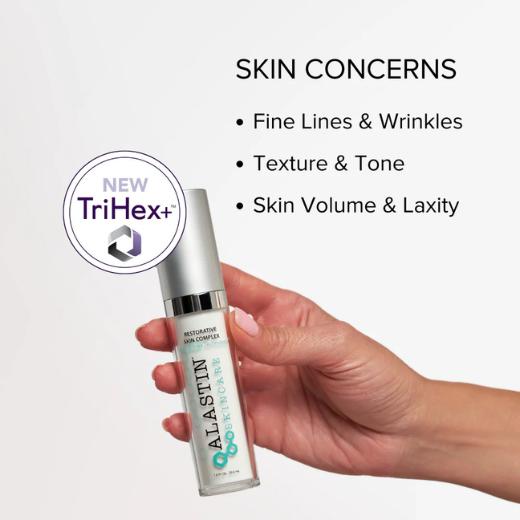 Woman applying Restorative Skin Complex to her face