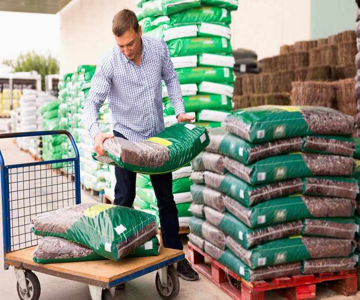 Man purchasing peat-free compost