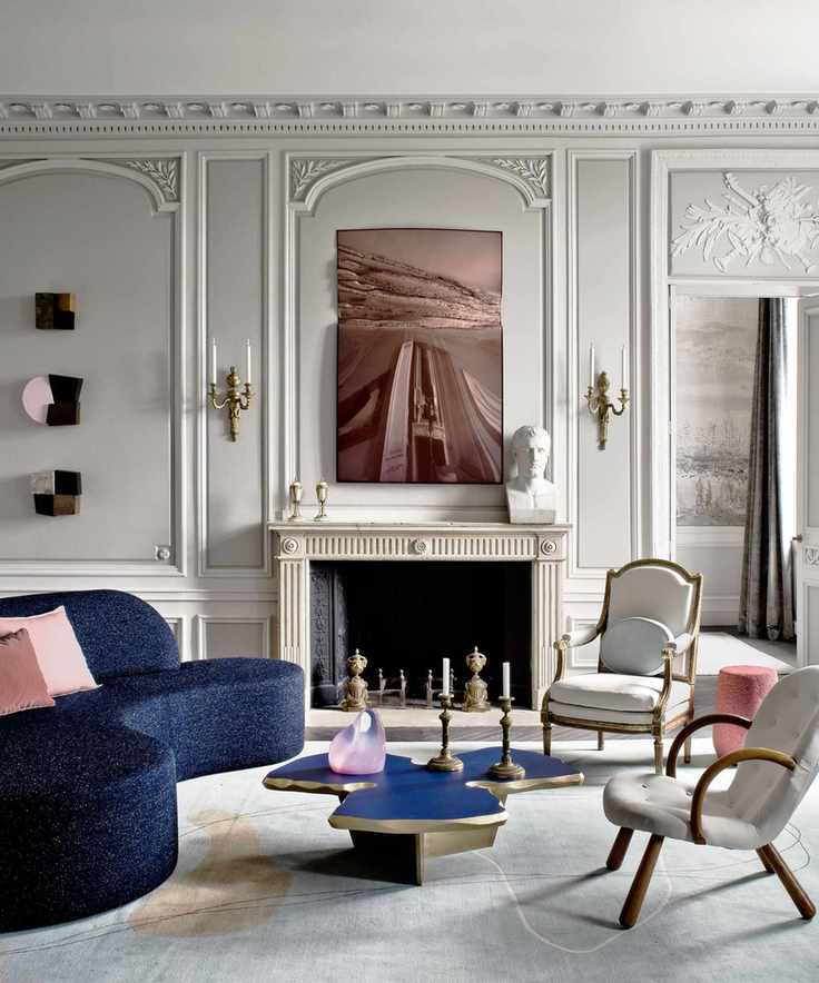 A contemporary room featuring Regency-style elements with modern touches