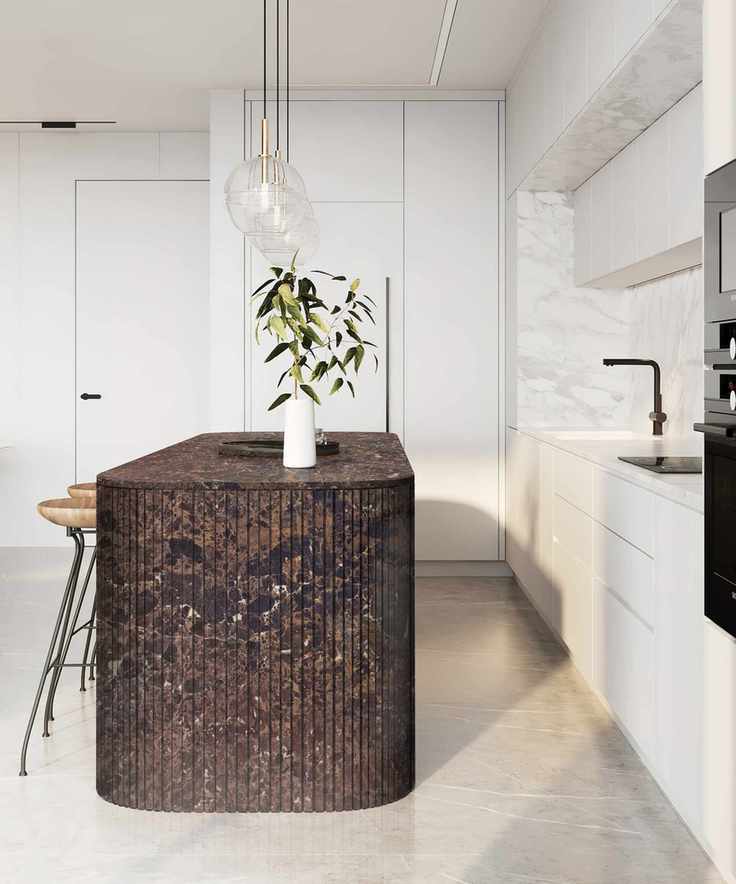 brown marble island in white kitchen