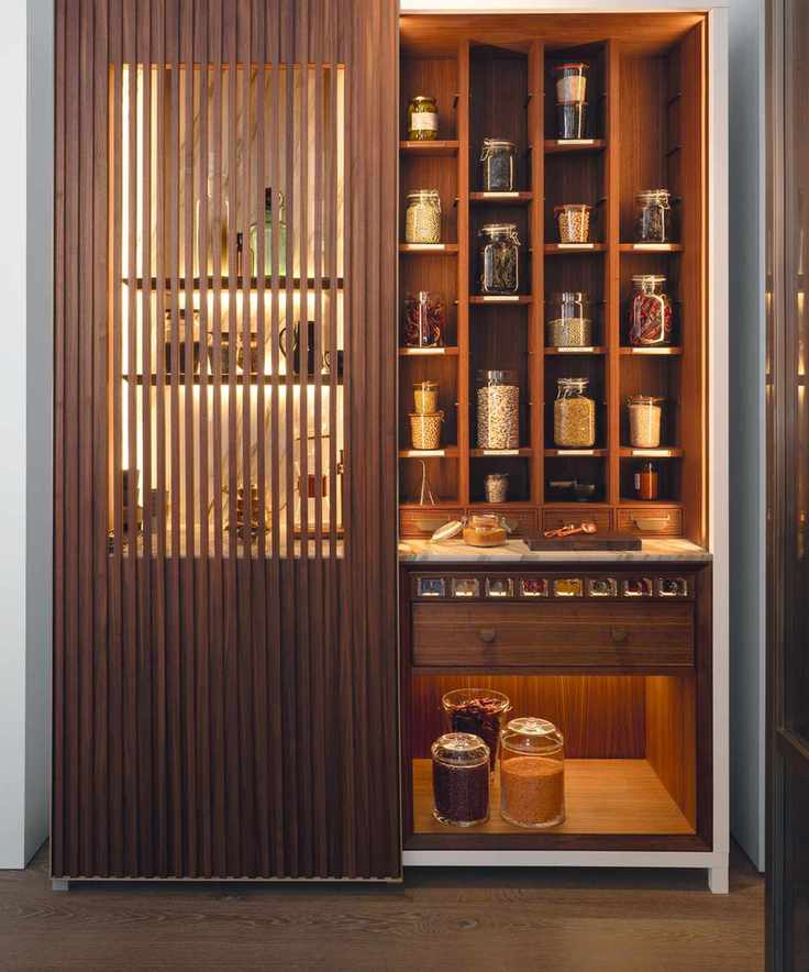 Kitchen storage made from American walnut with LED lighting