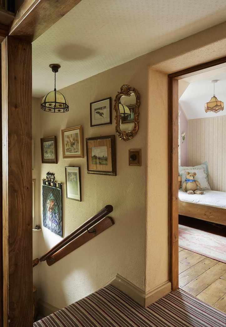 gallery wall on stairs in cottage staircase ideas