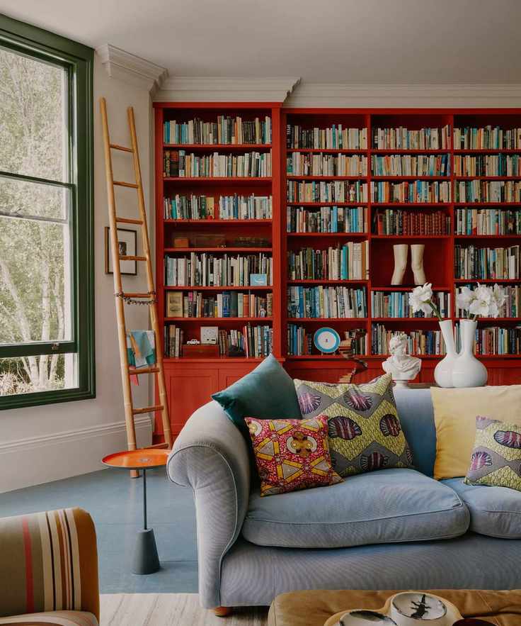 Living room with bright red shelves