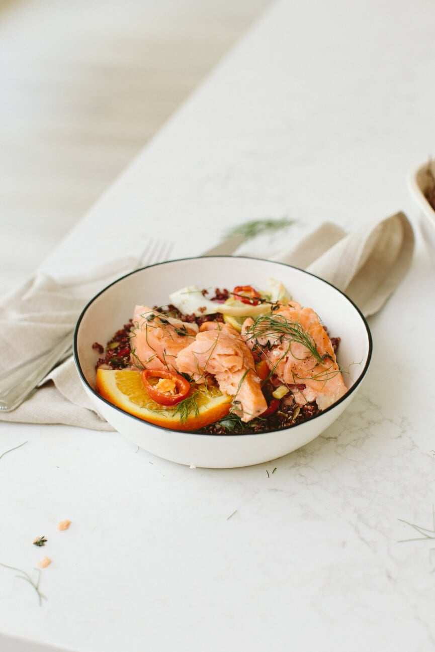 baked salmon with fennel and citrus in bowl