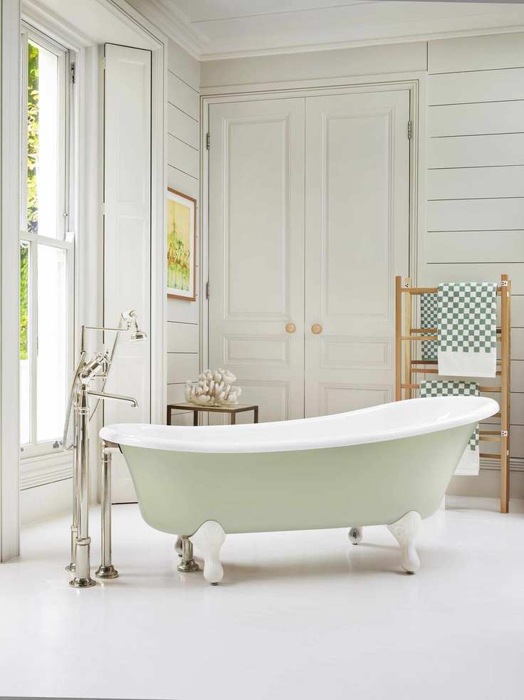 green slipper bath in bathroom