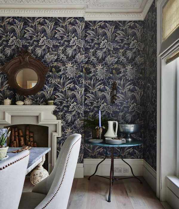 Dark botanical wallpaper in dining room
