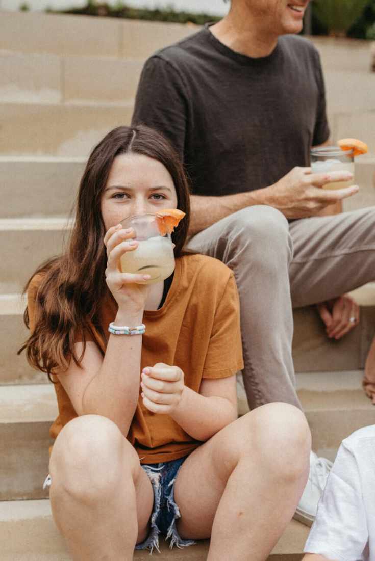 Girl Drinking Grapefruit Drink