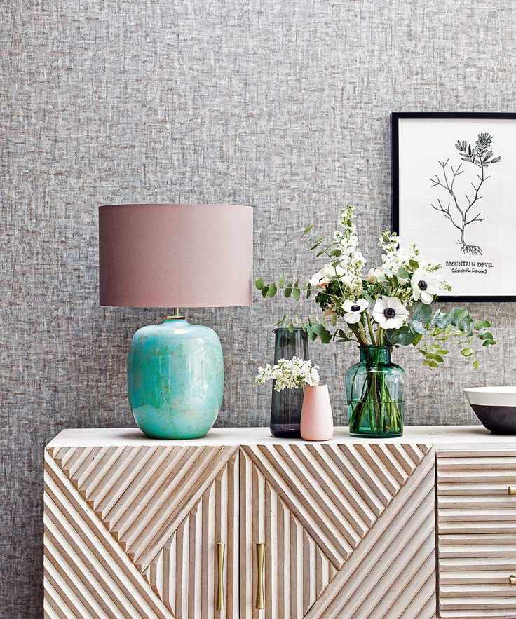 Sideboard with lamp and candles