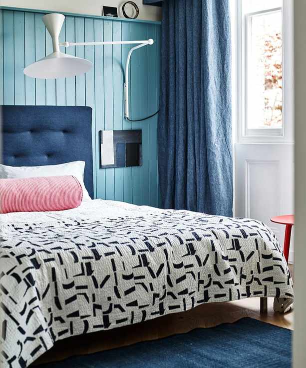 Coastal bedroom with a breezy palette of blues