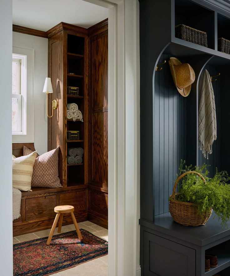 entryway with a dark navy coat stand with hooks