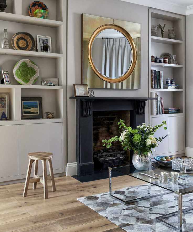 Living room layout ideas with shelving and fireplace