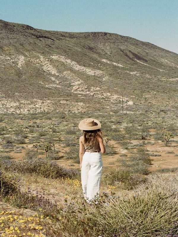 Woman walking through Joshua Tree