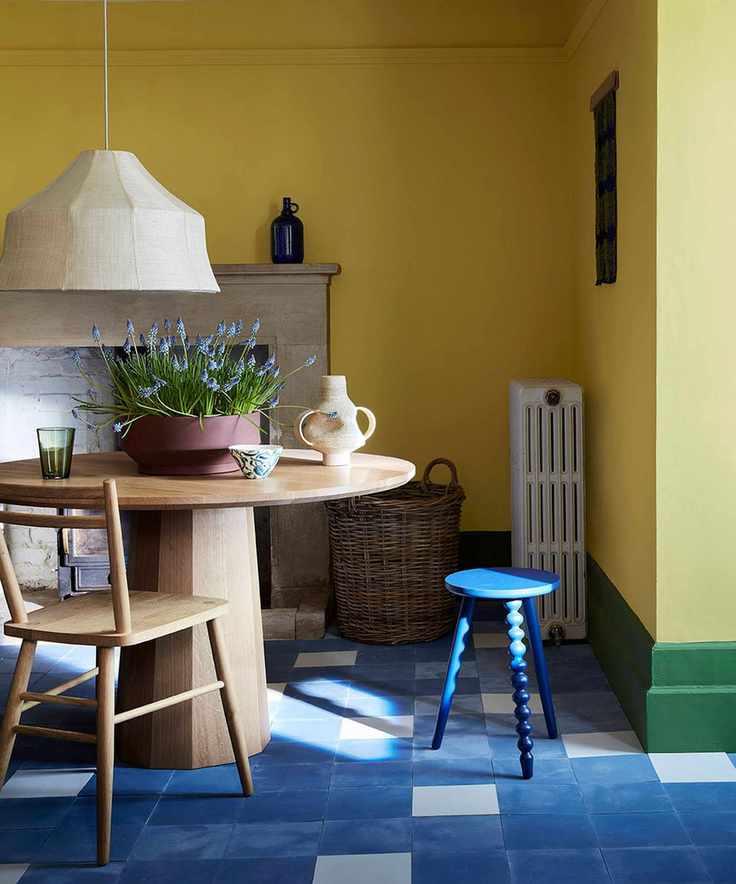 Colorful dining room with blue tiled floor