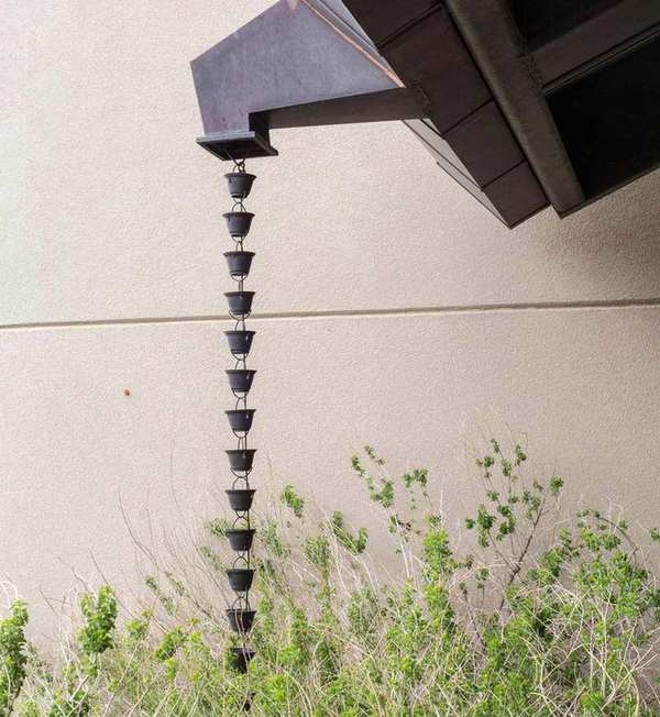 Rain chain in a wet garden