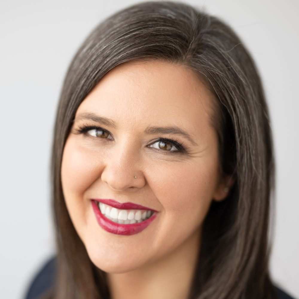 A headshot of Devon Fegen-Herdman