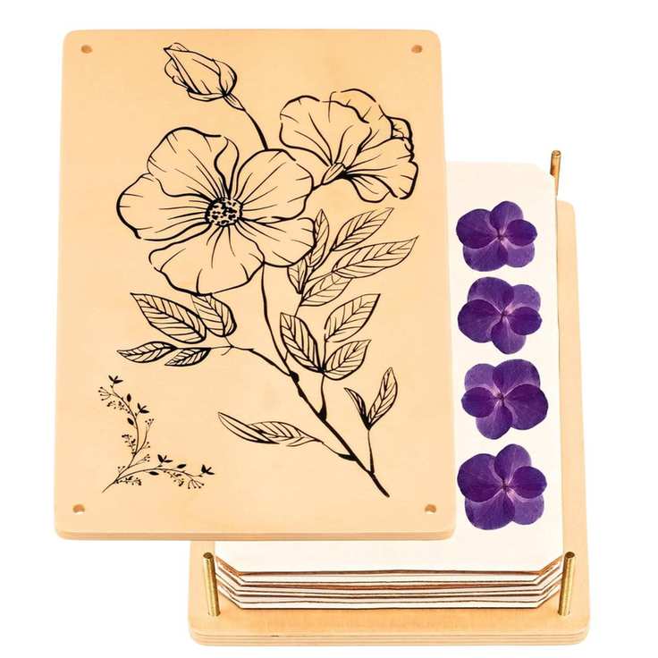 A wooden flower press