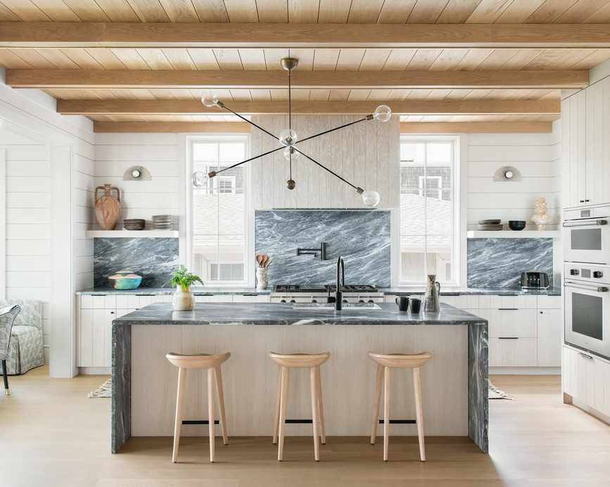 Chic white kitchen showcasing various textures