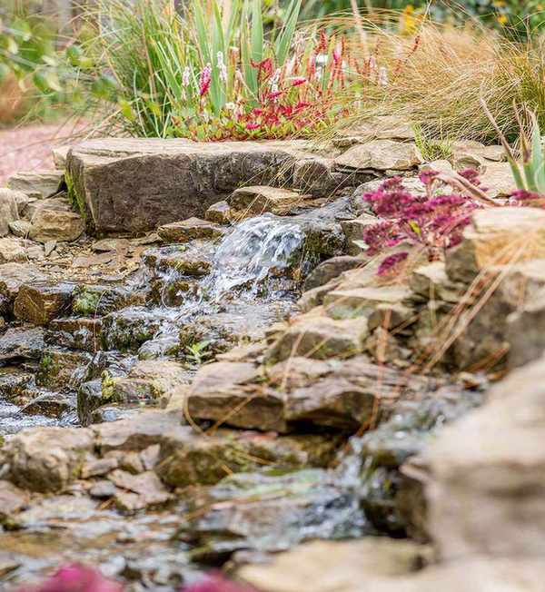 rocks in water feature with waterfall