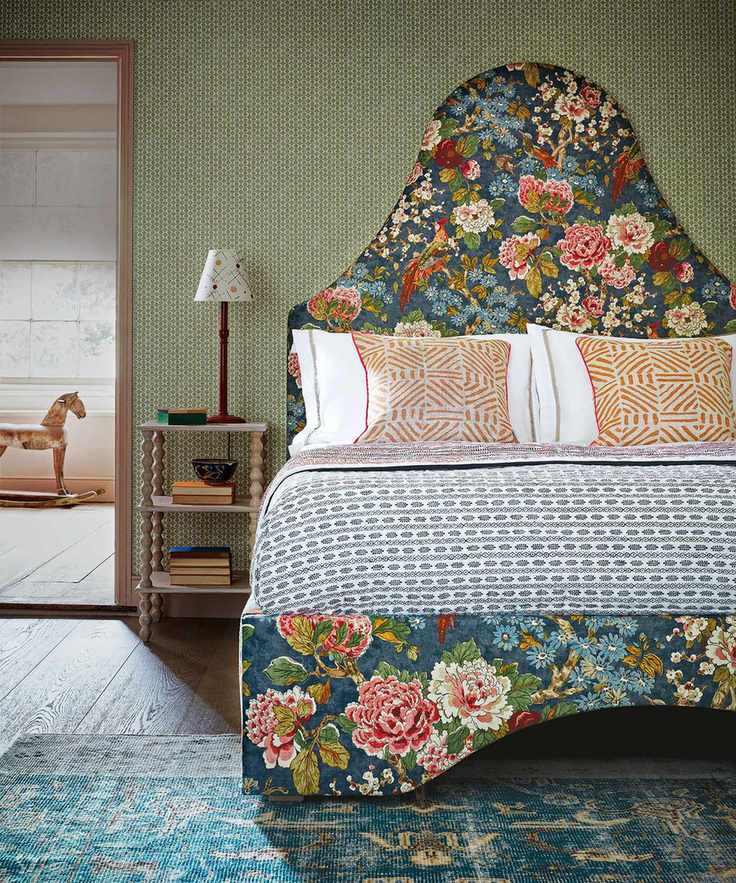 Romantic bedroom with floral headboard and bed frame