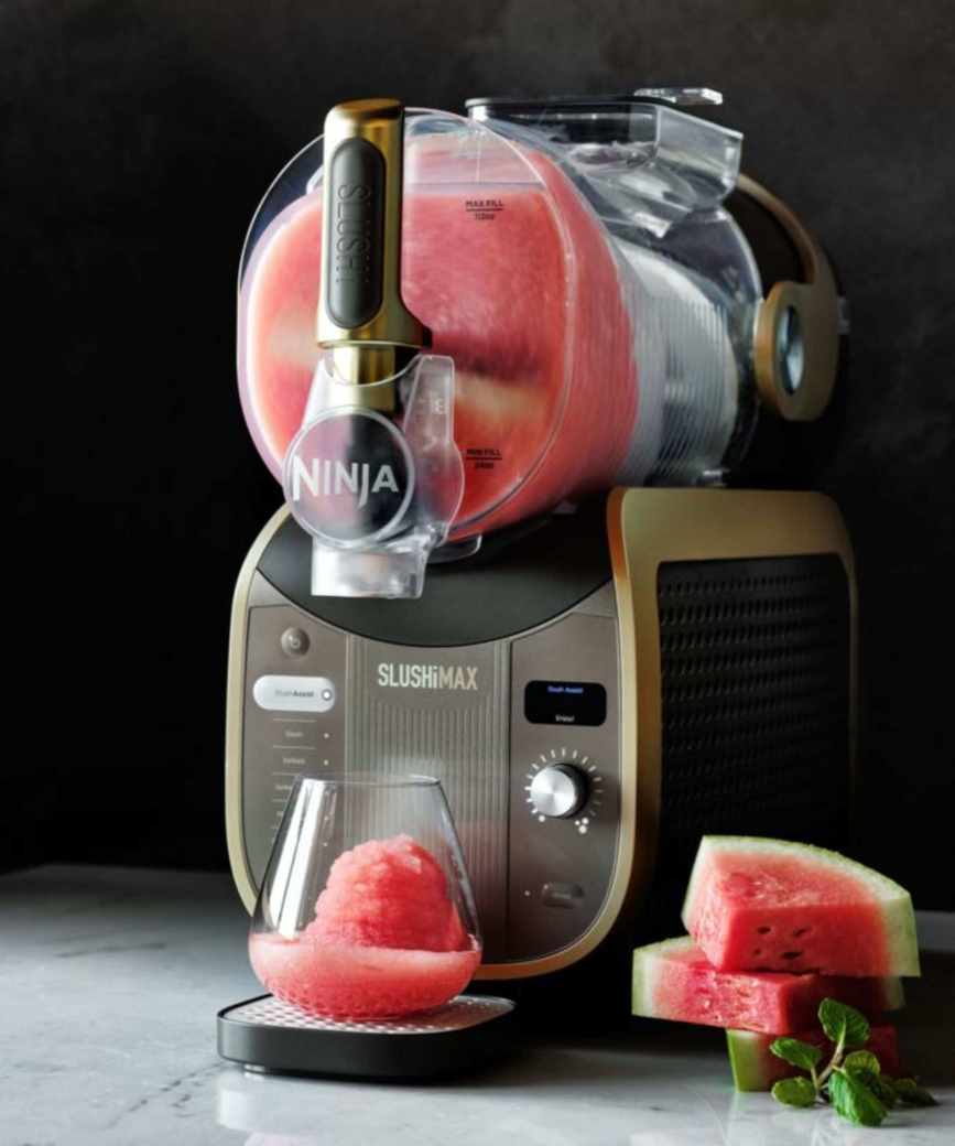The Ninja SLUSHi Max filled with slush mix on a countertop.