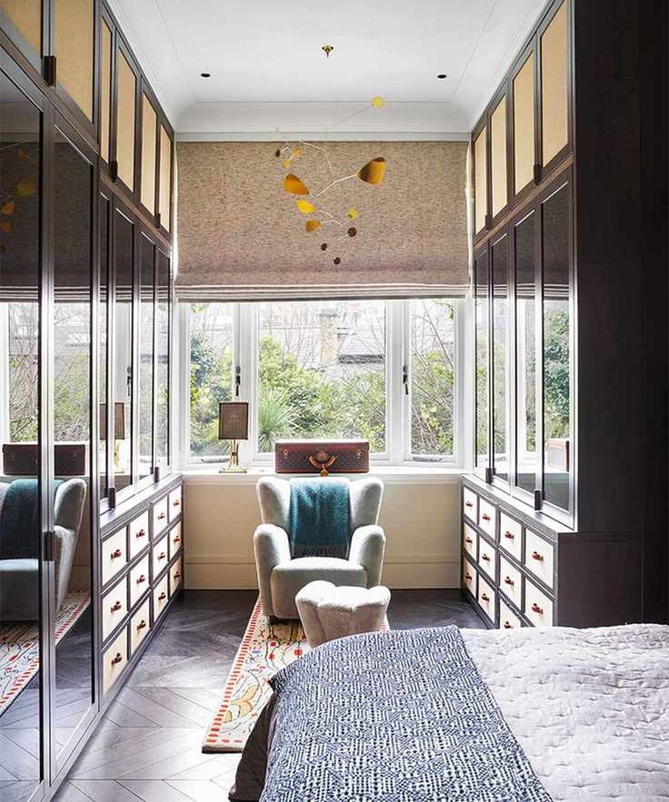 Small bedroom ideas featuring a dressing room and mirrored wardrobes