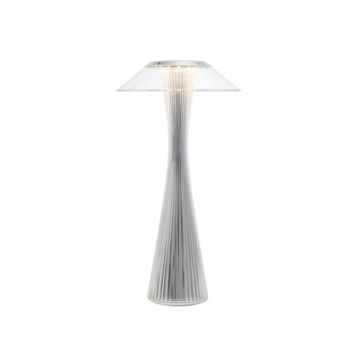 A chrome outdoor table lamp