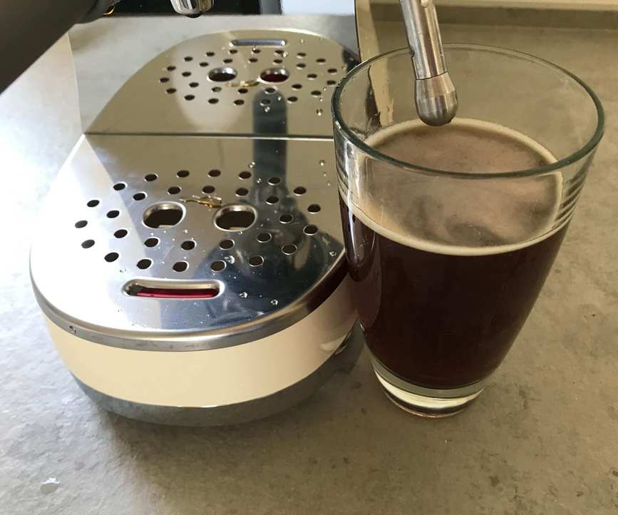 Smeg ECF02 making an Americano in a glass