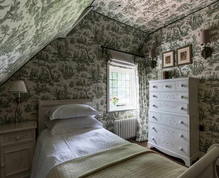 Cottage bedroom with toile wallpaper on walls and ceilings