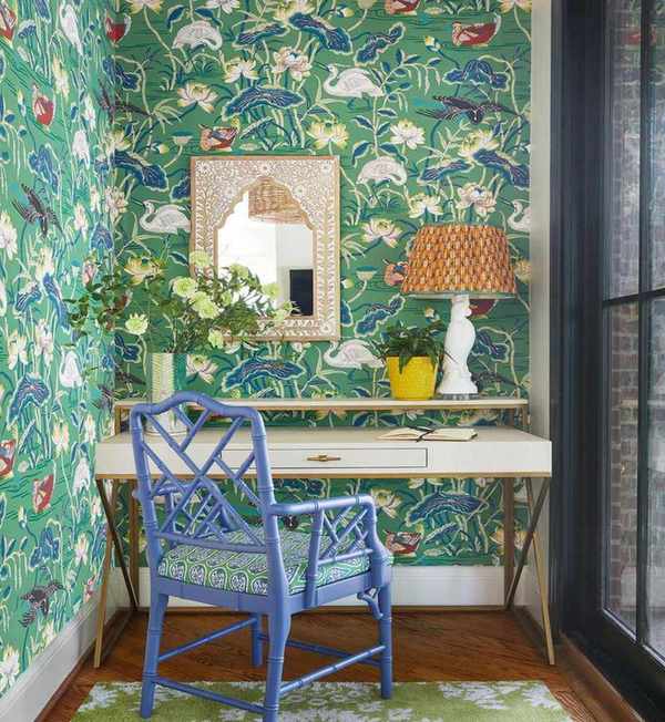 Home office with layered patterns and vibrant decor