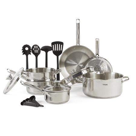 A complete set of stainless steel pans stacked together with lids.
