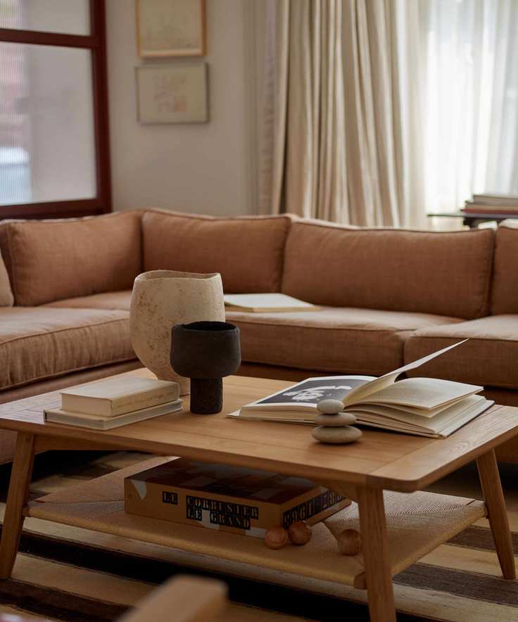 neptune styled coffee table with japandi decor
