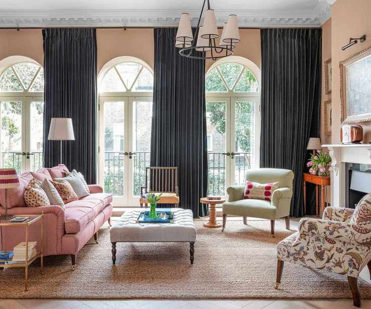 Living room with long dark curtains
