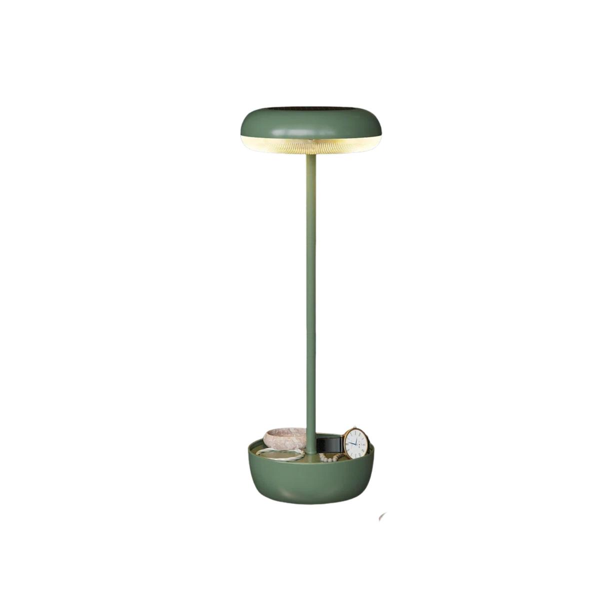 A green mushroom-shaped table lamp with bracelets in the base