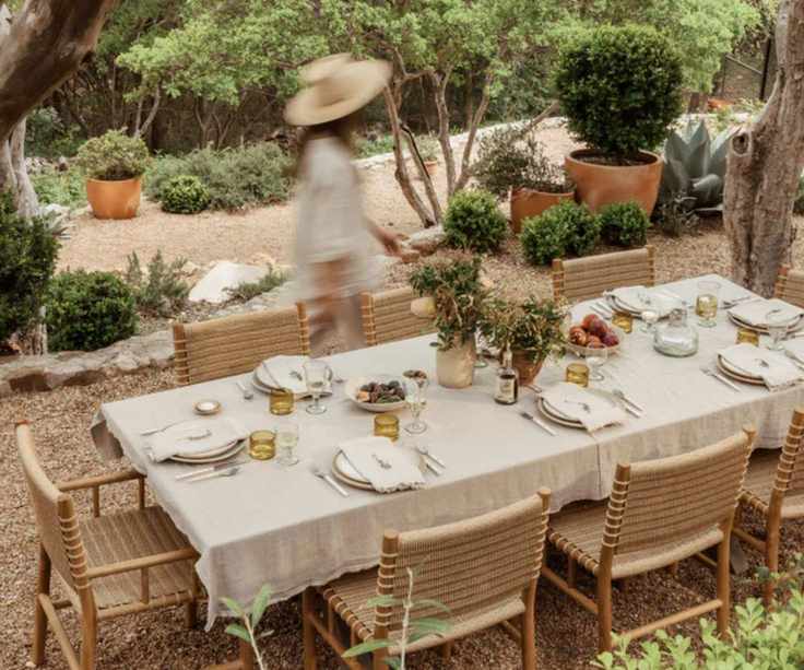 hati home outdoor furniture lifestyle image with a boho dining table set up