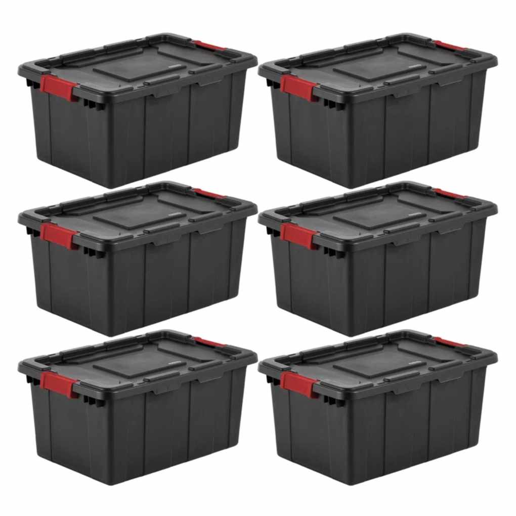 A set of six black storage boxes with red latch lids