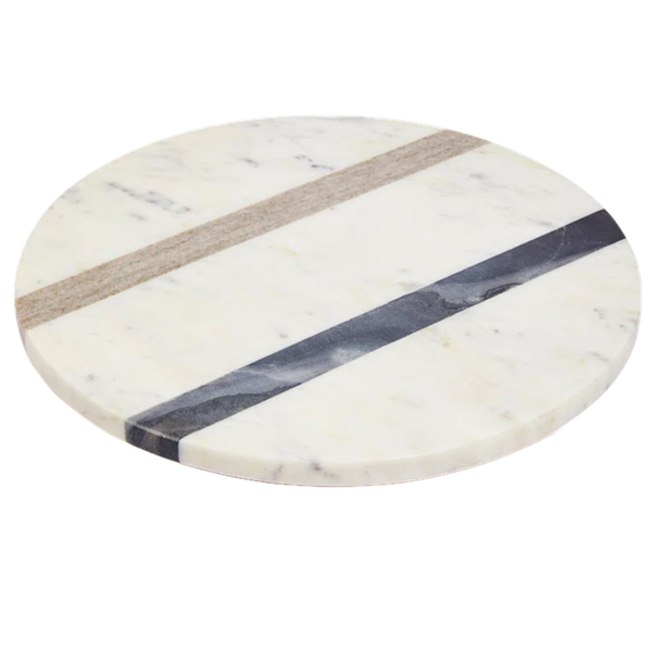 a lazy susan turntable made from natural marble with a singular dark blue and beige stripe on it
