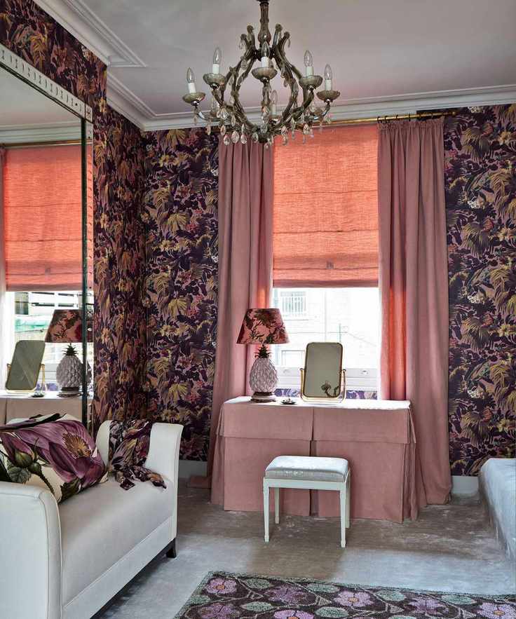 Vintage dressing room with dark wallpaper and chandelier